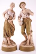 A pair of Royal Dux water carrier figures, pink applied pad, impressed Number 2156 and 2155,