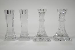 A pair of Waterford crystal John Rocha candlesticks together with ....
