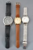 A collection of wristwatches, to include a gold plated Seiko watch with leather strap,