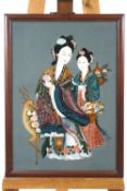 A Chinese Verre Eglomise panel depicting two ladies with flowers and a deer,