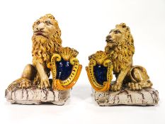 A pair of Faence figures of lions in the Italian Renaissance style, polychrome decorated,