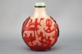 A carved glass snuff bottle,