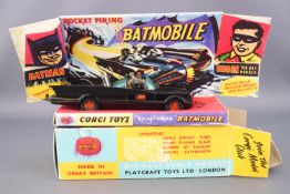 A Corgi 267 Batmobile, boxed and a Dinky 902 Fodin Flat Truck,