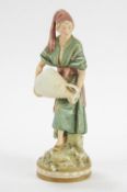A Royal Dux figure of a water carrier, with applied triangular pad mark,