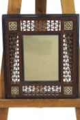 Two Moroccan style frames inlaid with ebony mother of pearl and bone,
