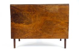 A George III mahogany single drop leaf dining table of plain rectangular form,