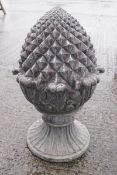 A cast iron pine cone finial, with simulated lead patina,
