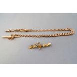 A rose metal graduated albert chain with Tbar and swivel clasp,