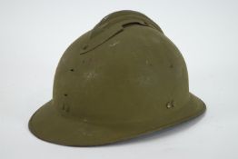 A French 1930's Adrian Army helmet, with original leather chin strap. 31cm.