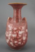 A studio vase by Marianne de Trey, in porcelain, of baluster form with 'pinched' vestigial handles,