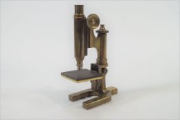 A brass platform microscope by W Watson & Sons Ltd, 815 High Holborn, London, No 17667,