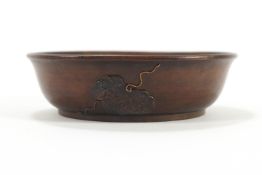 A Japanese turned wood bowl with bronze patinated mounts of leaves and fruit,