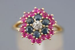 A yellow metal cluster ring set with rubies, sapphires and single cut diamonds.