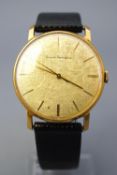 A gold plated wristwatch. Circular gold dial with baton markings and signed Girard Perregaux.