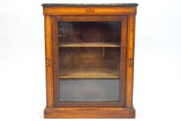 A walnut pier cabinet with sample wood inlaid decoration,