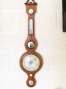 An 18th century mahogany banjo barometer by J Pini, 23 Brook St, Holborn, London,