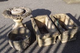 A pair of composite rectangular garden planters, decorated with strapwork and shells,