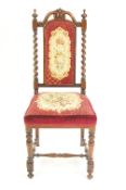 A walnut miniature chair with embroidered padded seat and back,