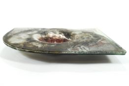 A signed Svetlana Art glass bowl with a central copper finish in a rounded rectangular surround,