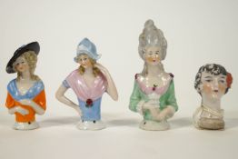 Three early 20th century Continental porcelain ladies, pin cushion torso's,