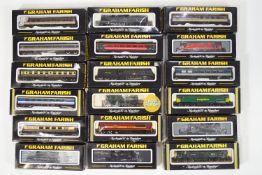 A large quantity (76) of Graham Farish 'N' gauge trains and rolling stock (in case),