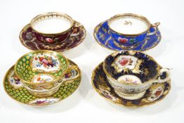 Four early 19th century English porcelain tea cups and saucers,