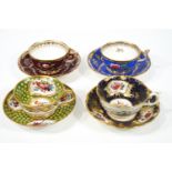 Four early 19th century English porcelain tea cups and saucers,