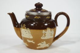 A Royal Doulton stoneware miniature teapot and cover with silver rim, London 1902,