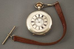 A demi hunter pocket watch. Manual wind movement, signed Hall and Co.