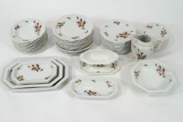 A Rosenthal porcelain 'Maria' pattern dinner service, transfer printed in colours with rose sprays,