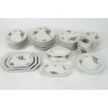 A Rosenthal porcelain 'Maria' pattern dinner service, transfer printed in colours with rose sprays,