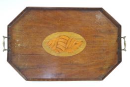 An Edwardian mahogany rectangular tray with brass handles, the centre inlaid with a shell,