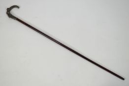 A walking cane, the cast metal handle with an Art Nouveau style lady,