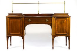 A George III style mahogany sideboard with satinwood stringing,