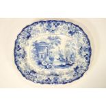 A 19th century earthenware meat dish, printed in blue with the 'Corinthian' pattern,