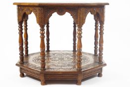 A late 19th century oak octagonal table,
