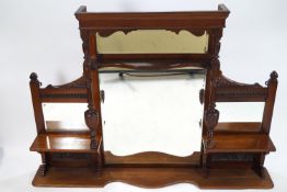 A late 19th century mahogany over mantel with rectangular top over a four mirror section
