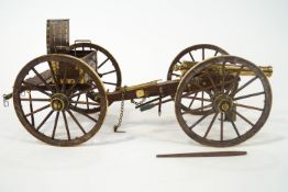 A Cannon craft oak and brass scale model of an American Civil War gun on carriage,