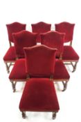 A set of six oak and red upholstered dining chairs by Hampton & Sons, Pall Mall, East London,
