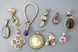 A collection of ten pendants of variable designs (Nine stamped 925 for sterling silver).