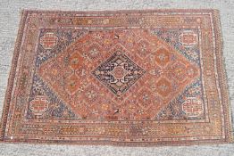 A Middle Eastern rug of traditional design,