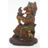 A 19th century cast iron Punch & Judy doorstop, painted,
