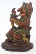 A 19th century cast iron Punch & Judy doorstop, painted,