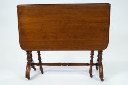 A light wood Sutherland table, of traditional form,