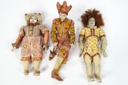 Three 20th century dolls with individual pottery heads and hands and stuffed bodies