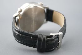 A stainless steel JF dress watch. Quartz movement, leather strap.