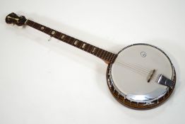 A German mixed hardwood five string Banjo,