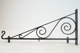 A wrought iron shop sign bracket,