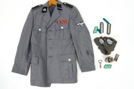 A Joba Waghausel Third Reich grey single breasted uniform jacket with applied embroidered badges