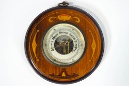A wall barometer, the mahogany case inlaid with Art Nouveau style marquetry,